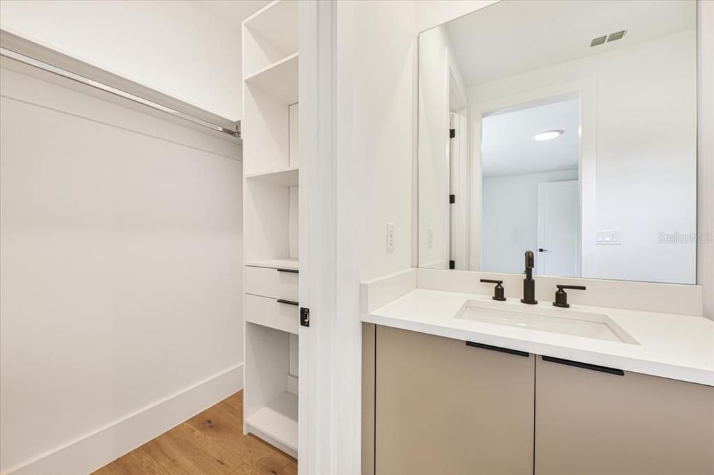 Bathroom, Dual Sink Vanities, Interior, Recessed Lighting, Wood Texture Flooring