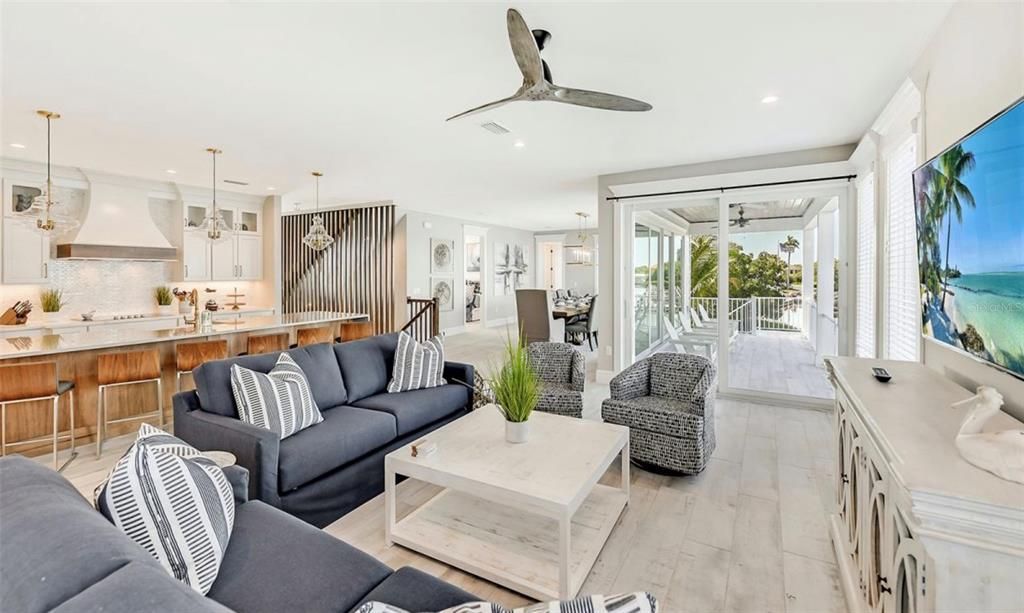 Dining room, Interior, Kitchen, Living room, Pendant Lights, Recessed Lighting, Water, Wood Texture Flooring