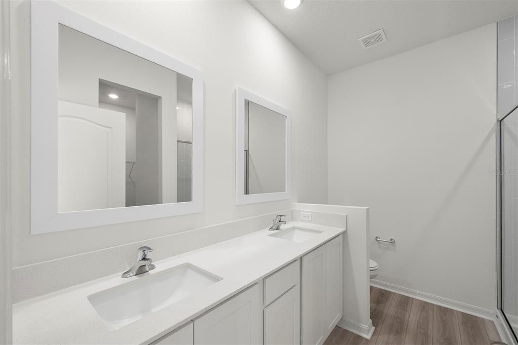 Bathroom, Dual Sink Vanities, Interior, Recessed Lighting, Wood Texture Flooring