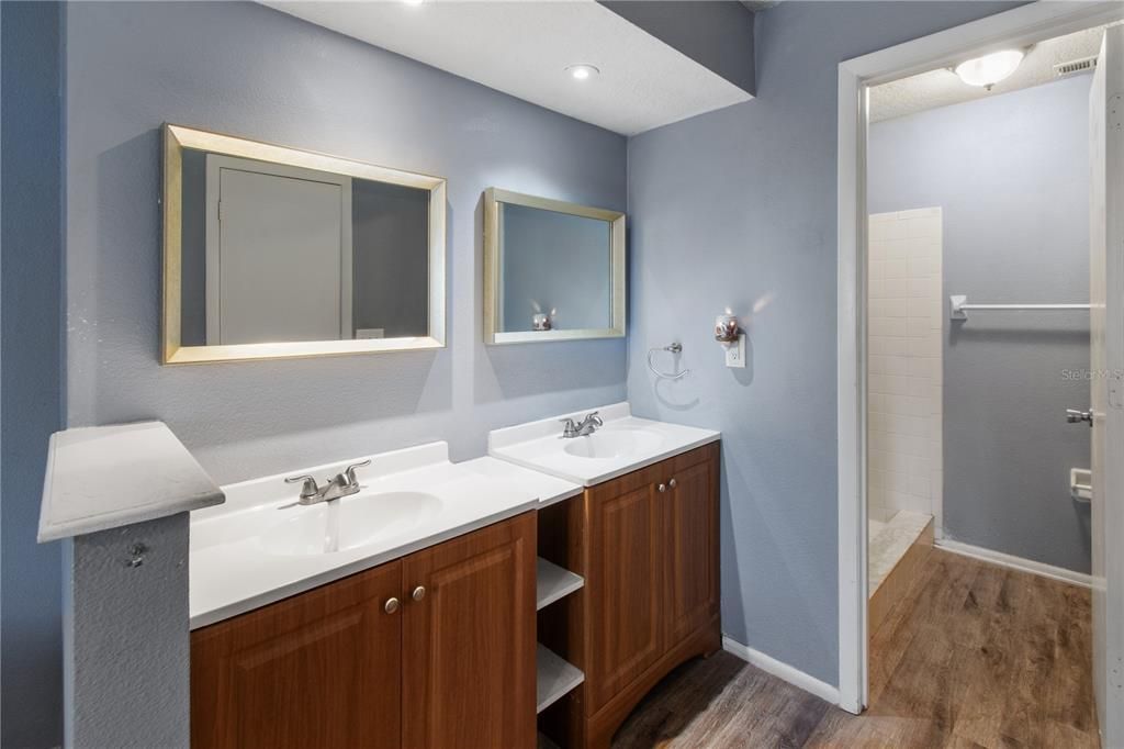 Bathroom, Dual Sink Vanities, Interior, Recessed Lighting, Wood Texture Flooring