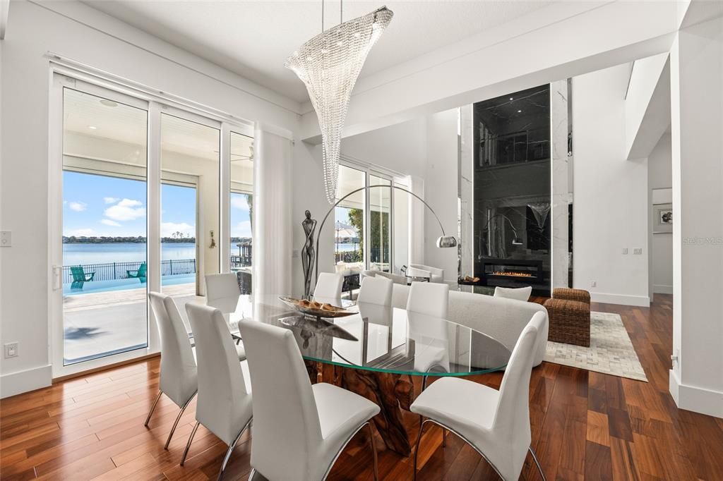 Chandelier, Dining room, Fireplace, Interior, Water, Wood Texture Flooring