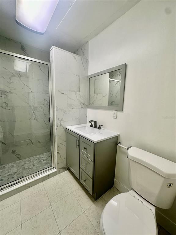 Bathroom, Dual Sink Vanities, Glass Shower, Interior, Marble Walls