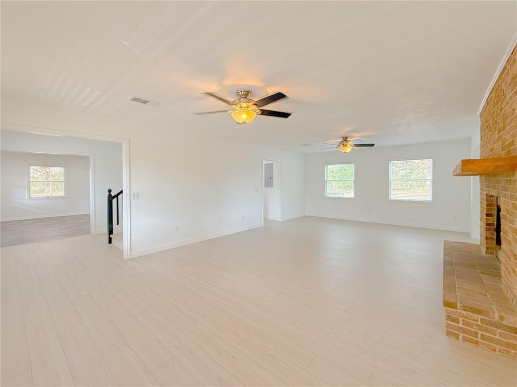 Empty room, Fireplace, Interior, Stone Walls, Wood Texture Flooring