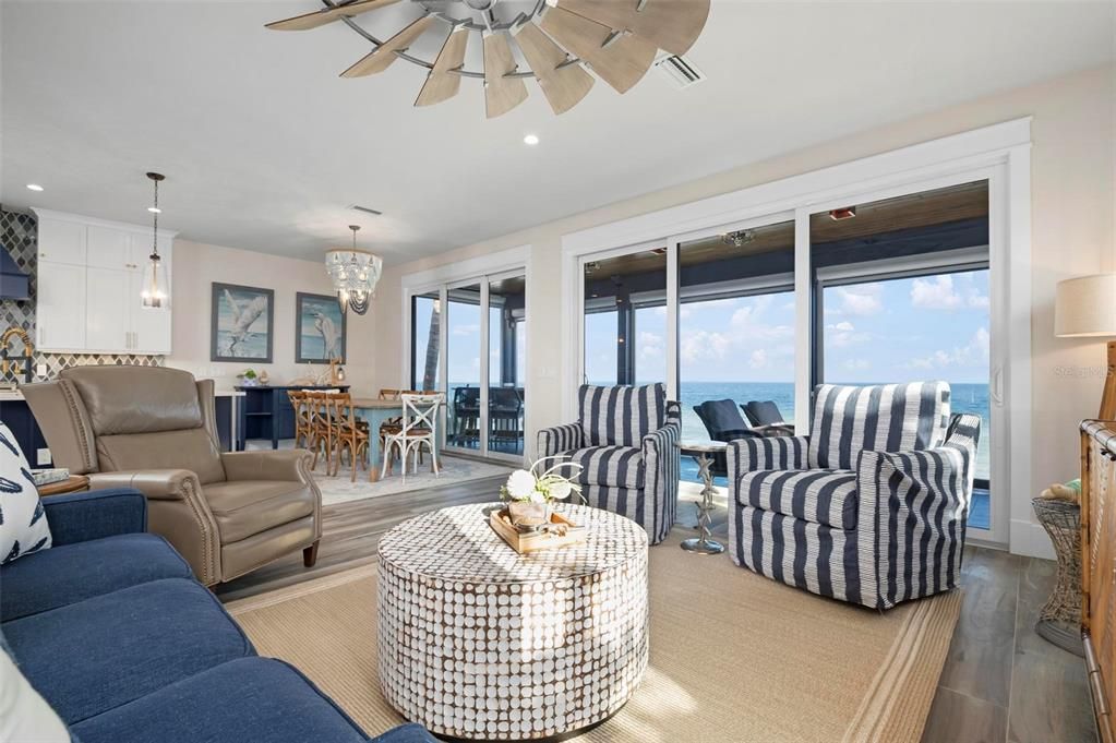 Chandelier, Dining room, Interior, Living room, Pendant Lights, Recessed Lighting, Water, Wood Texture Flooring