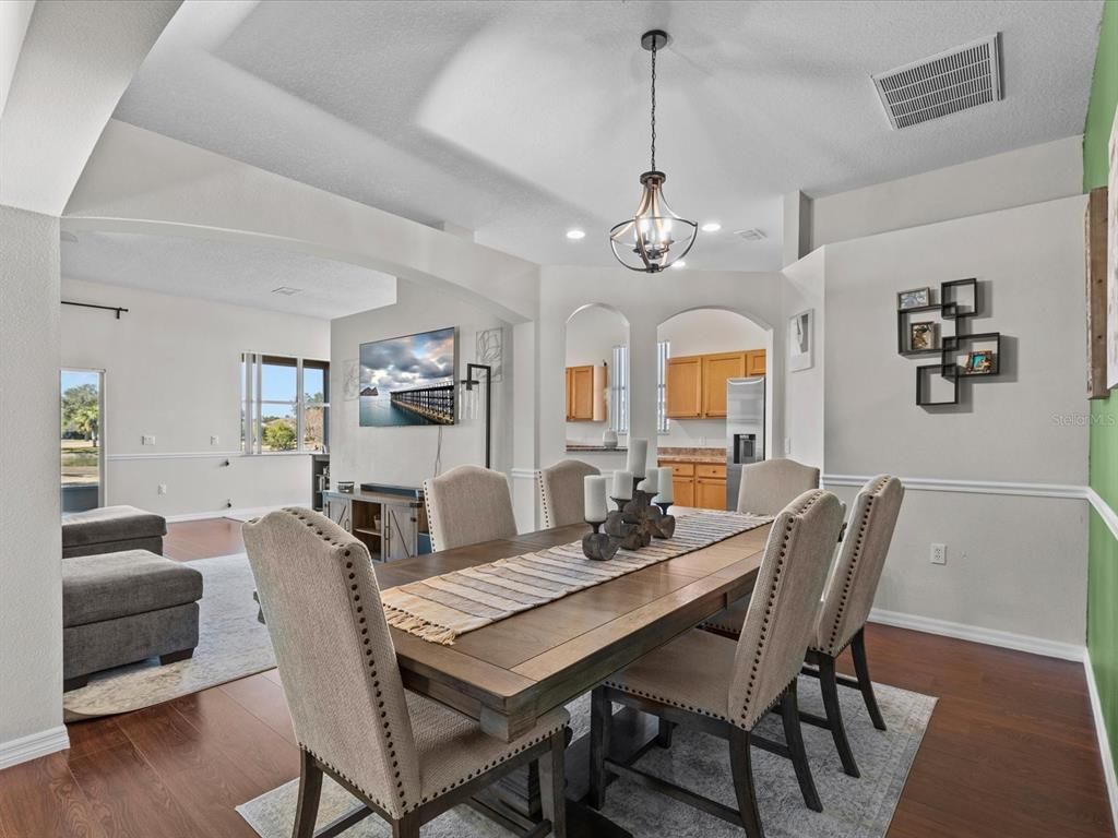 Chandelier, Dining room, Fireplace, Interior, Pendant Lights, Recessed Lighting, Wood Texture Flooring