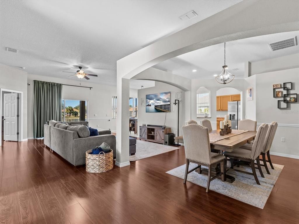 Dining room, Fireplace, Interior, Living room, Pendant Lights, Recessed Lighting, Wood Texture Flooring