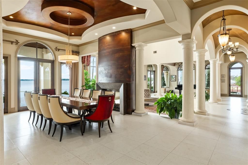 Chandelier, Dining room, Fireplace, Interior, Pendant Lights, Recessed Lighting, Water, Wooden Ceilings