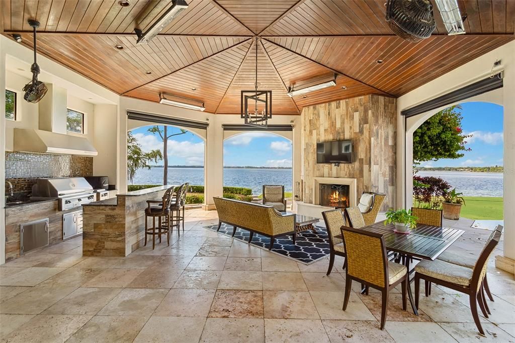 Dining room, Exterior, Fireplace, Interior, Pendant Lights, Water, Wooden Ceilings