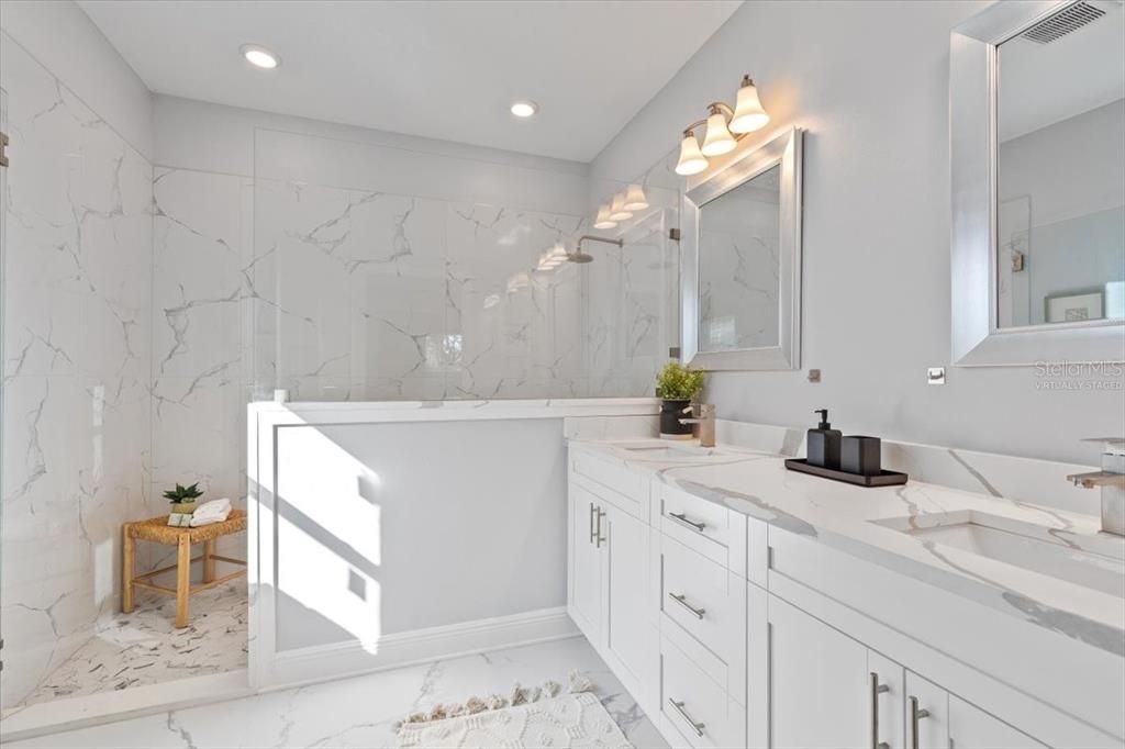 Bathroom, Dual Sink Vanities, Interior, Marble, Marble Walls, Recessed Lighting