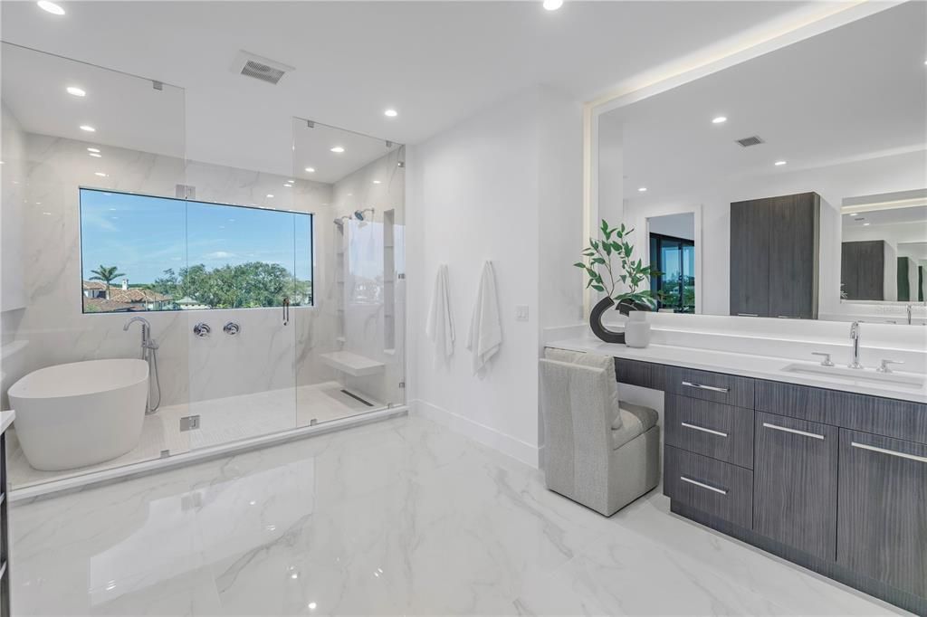 Bathroom, Dual Sink Vanities, Free Standing Baths, Glass Shower, Interior, Marble, Marble Walls, Recessed Lighting