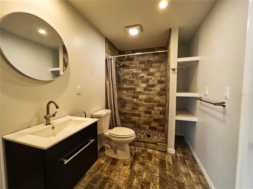 Bathroom, Glass Shower, Interior, Recessed Lighting, Wood Texture Flooring