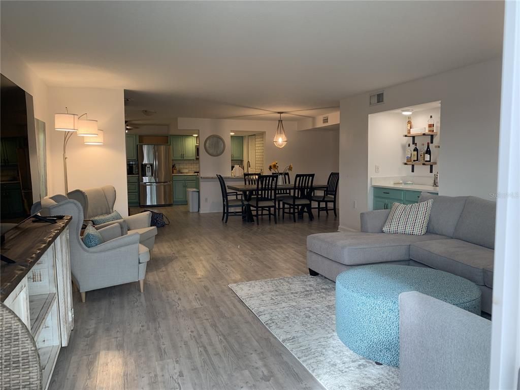 Dining room, Interior, Kitchen, Living room, Pendant Lights, Stainless Steel Appliances, Wood Texture Flooring