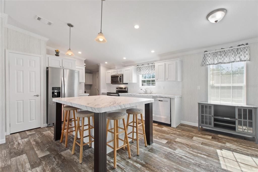 Interior, Kitchen, Pendant Lights, Recessed Lighting, Stainless Steel Appliances, Wood Texture Flooring