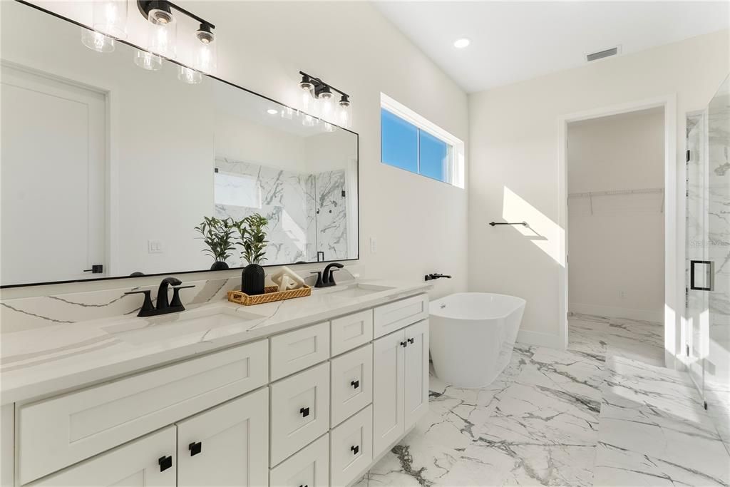 Bathroom, Dual Sink Vanities, Free Standing Baths, Glass Shower, Interior, Marble, Marble Walls, Recessed Lighting