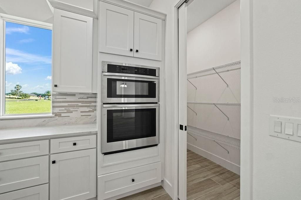 Interior, Kitchen, Marble Walls, Stainless Steel Appliances, Wood Texture Flooring