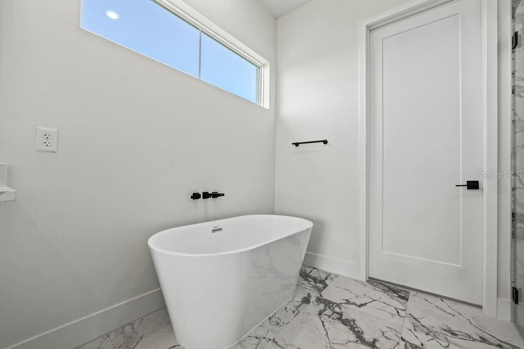 Bathroom, Free Standing Baths, Interior, Marble, Marble Walls, Recessed Lighting