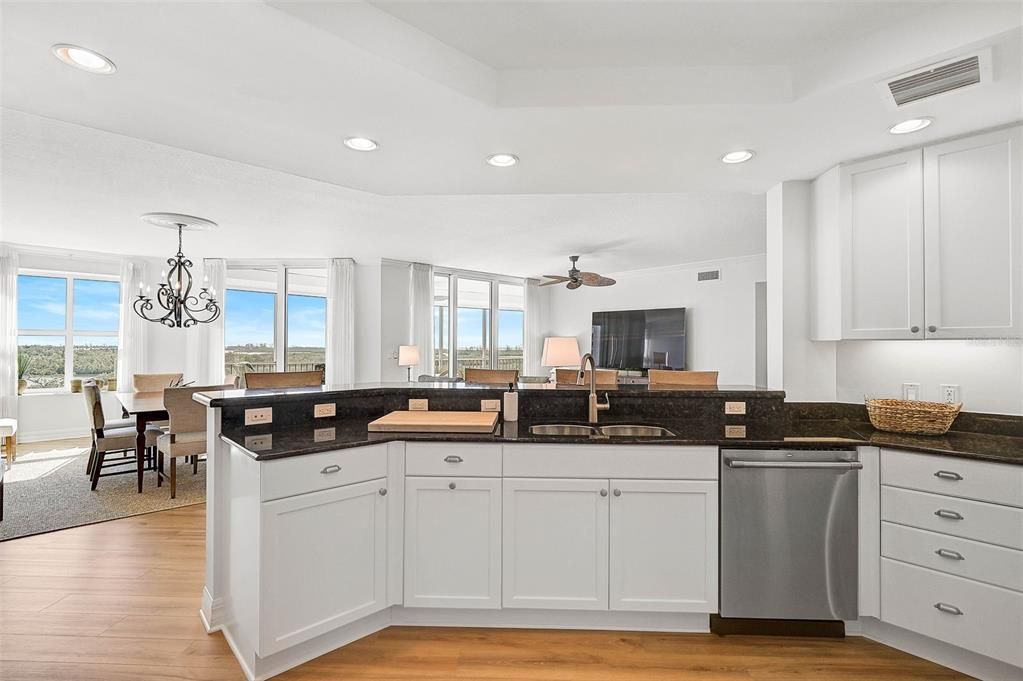 Chandelier, Dining room, Interior, Kitchen, Recessed Lighting, Water, Wood Texture Flooring