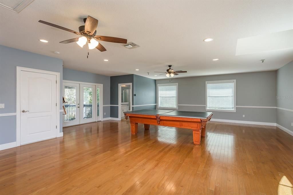 Billiard Table, Empty room, Game Room, Interior, Recessed Lighting, Wood Texture Flooring