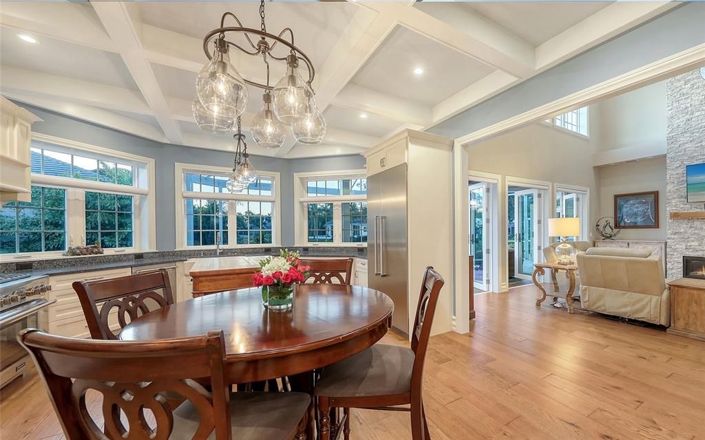 Dining room, Fireplace, Interior, Living room, Pendant Lights, Recessed Lighting, Wood Texture Flooring