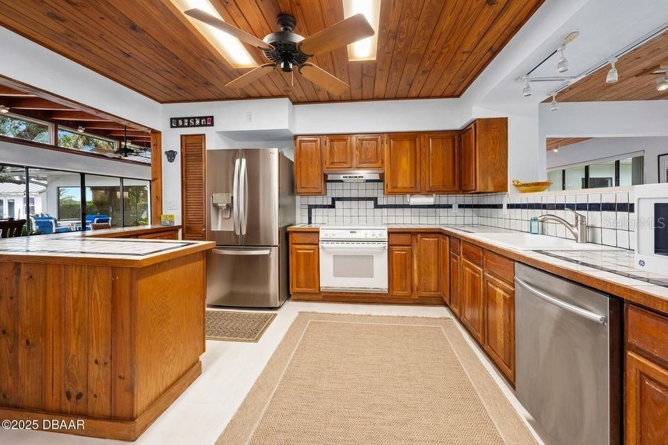 Interior, Kitchen, Stainless Steel Appliances, Tile Countertops, Wooden Ceilings