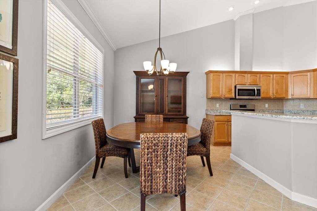 Chandelier, Dining room, Interior, Kitchen, Pendant Lights, Recessed Lighting, Stainless Steel Appliances