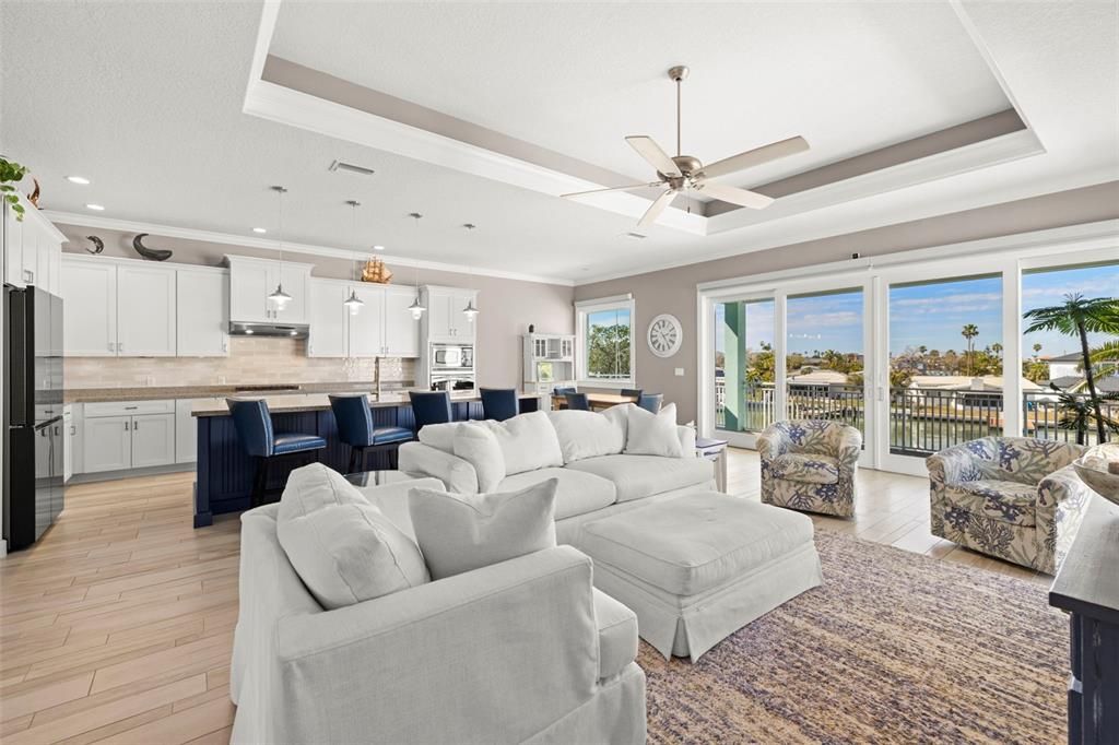 Interior, Kitchen, Living room, Pendant Lights, Recessed Lighting, Stainless Steel Appliances, Water, Wood Texture Flooring
