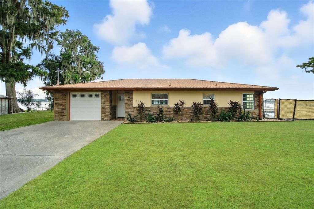 Attached, Backyard, Exterior, Facade, Brick Facade, Ranch