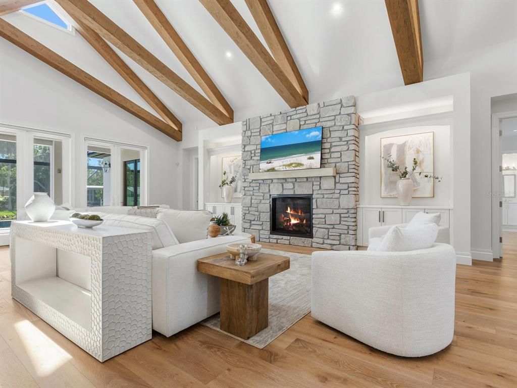 Fireplace, Interior, Living room, Recessed Lighting, Stone Walls, Wooden Beams, Wood Texture Flooring