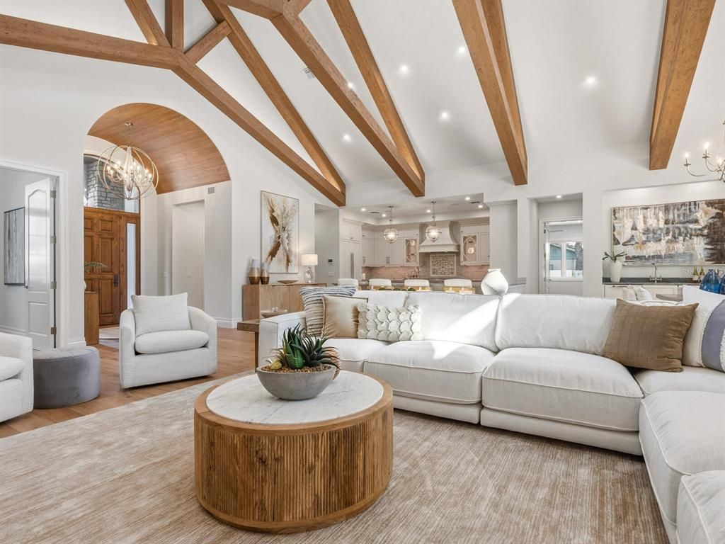 Chandelier, Interior, Kitchen, Living room, Pendant Lights, Recessed Lighting, Stainless Steel Appliances, Wooden Beams, Wood Texture Flooring