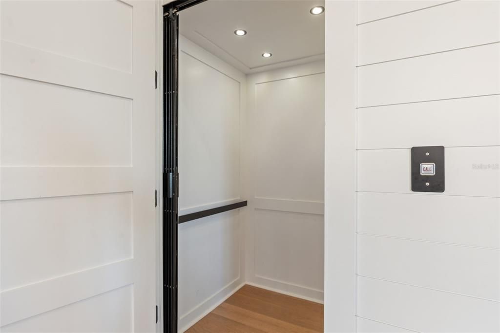Elevator, Interior, Recessed Lighting, Wood Texture Flooring