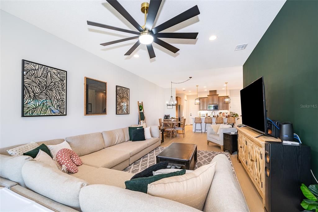 Dining room, Interior, Kitchen, Living room, Pendant Lights, Recessed Lighting, Stainless Steel Appliances, Wood Texture Flooring