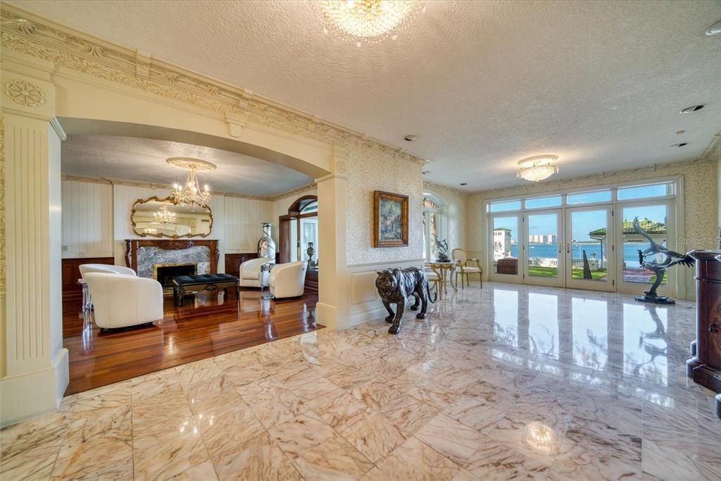 Chandelier, Fireplace, Interior, Living room, Marble, Water, Wood Texture Flooring
