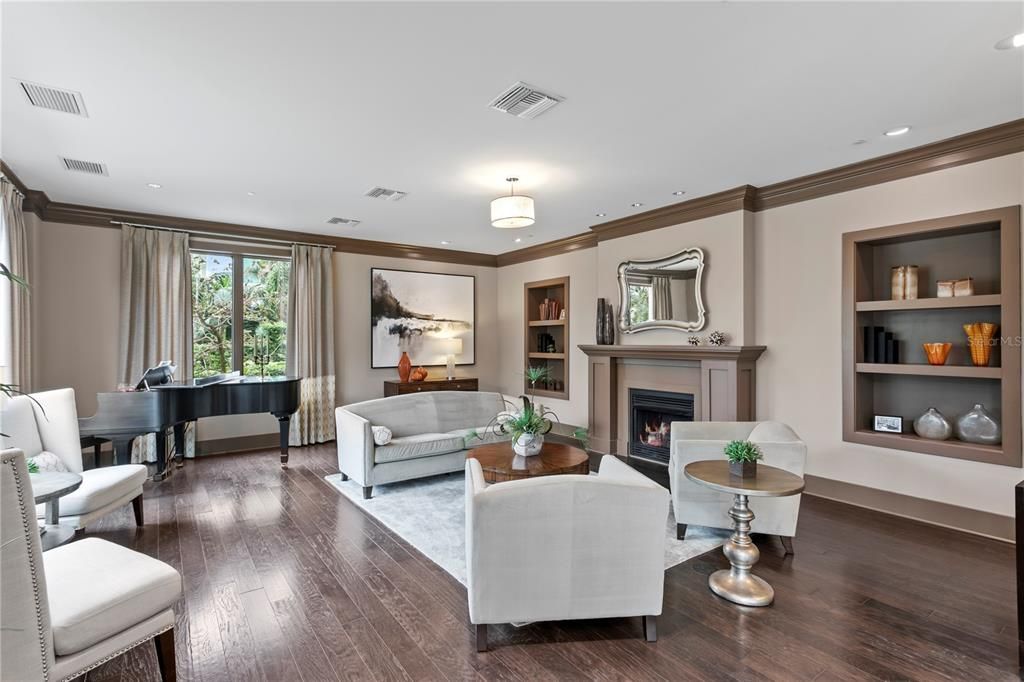 Fireplace, Interior, Living room, Piano, Recessed Lighting, Wood Texture Flooring