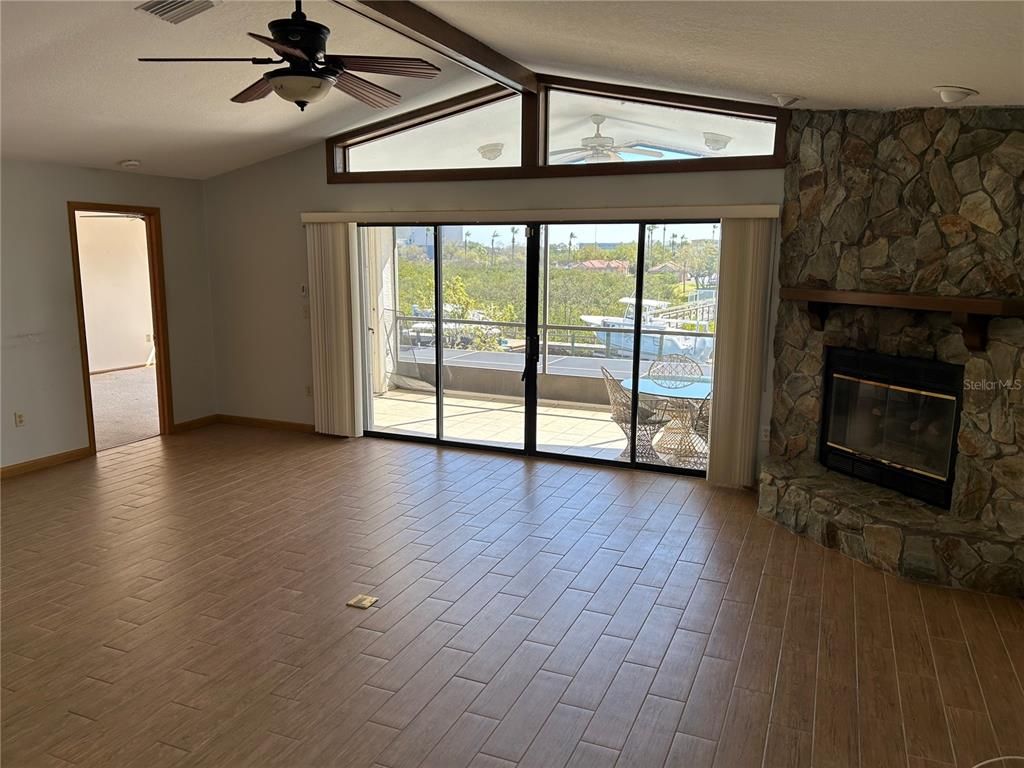 Empty room, Fireplace, Interior, Stone Walls, Wood Texture Flooring