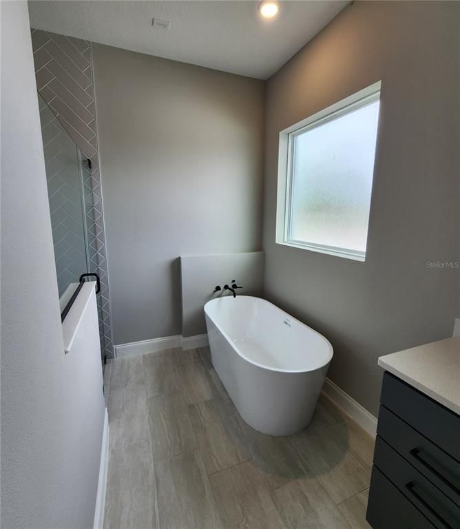 Bathroom, Free Standing Baths, Interior, Recessed Lighting, Wood Texture Flooring