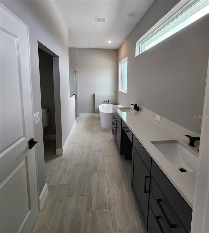 Bathroom, Dual Sink Vanities, Free Standing Baths, Interior, Recessed Lighting