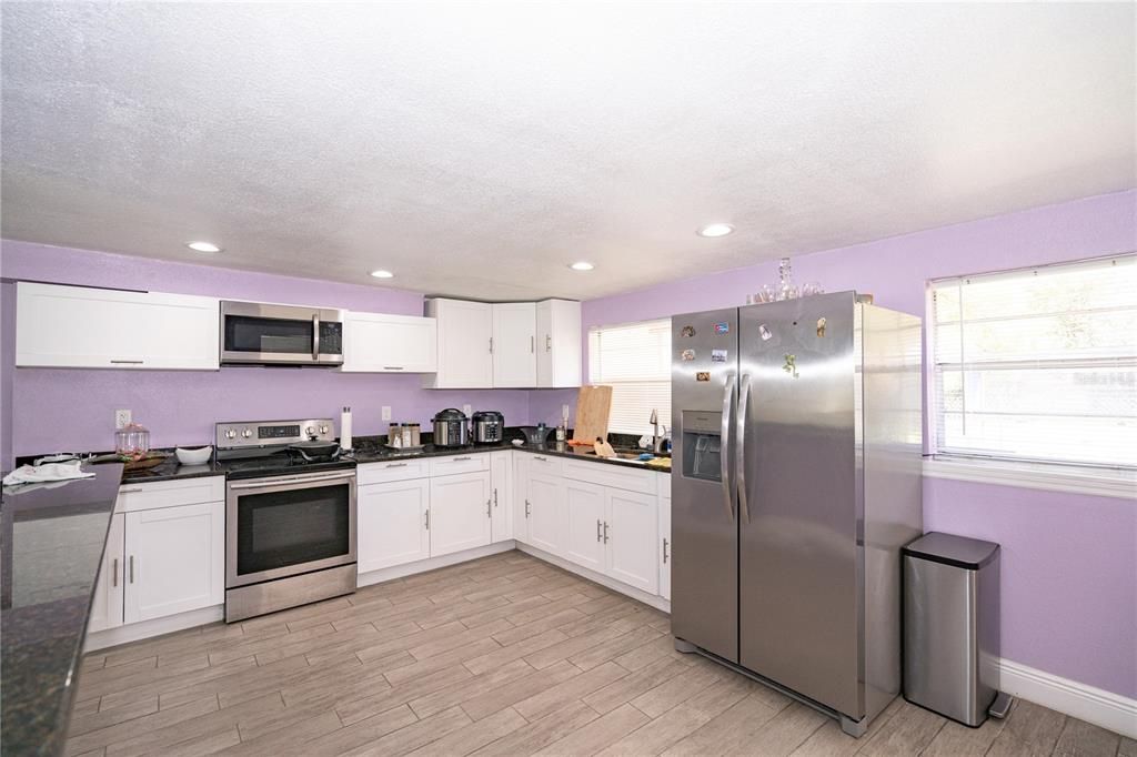 Interior, Kitchen, Recessed Lighting, Stainless Steel Appliances, Wood Texture Flooring