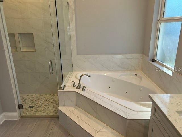 Bathroom, Glass Shower, Interior, Marble Walls, Wood Texture Flooring