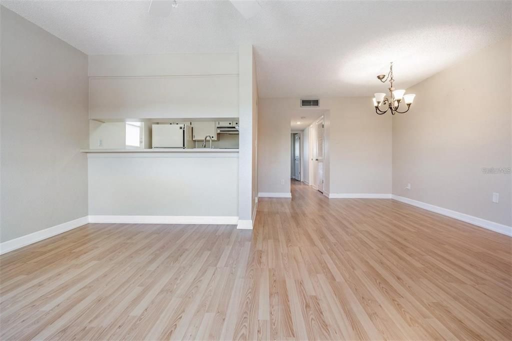 Chandelier, Empty room, Interior, Recessed Lighting, Wood Texture Flooring