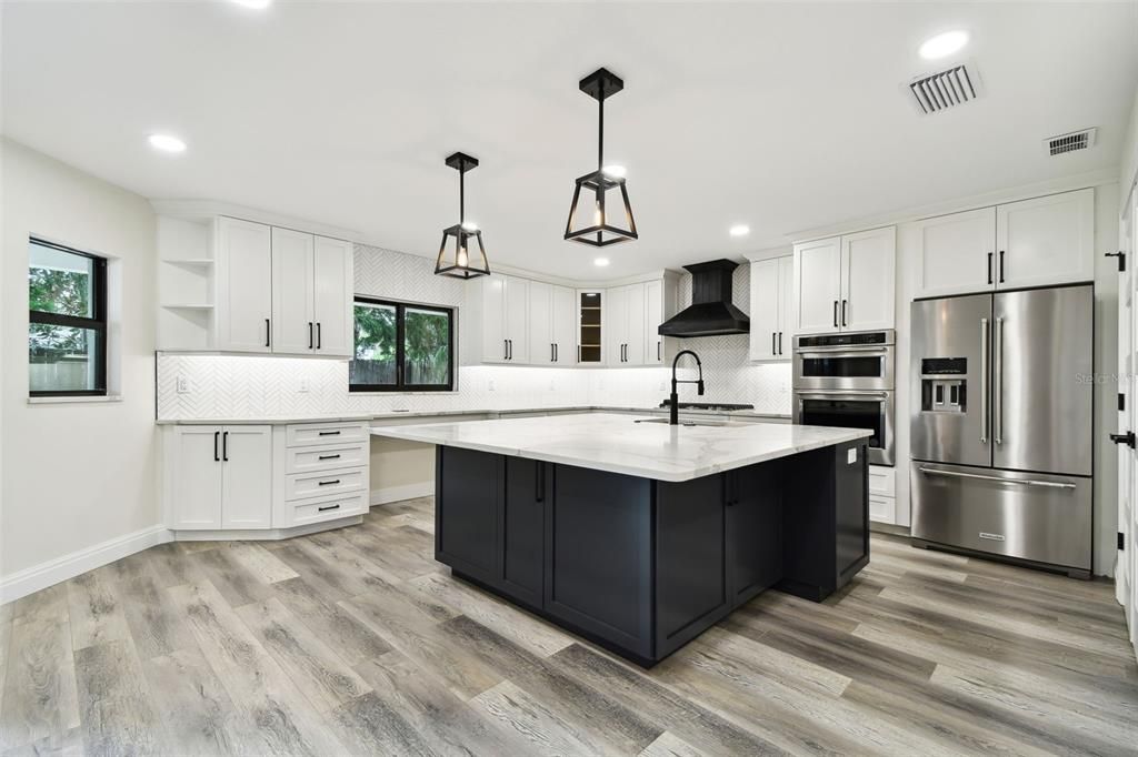 Interior, Kitchen, Pendant Lights, Recessed Lighting, Stainless Steel Appliances, Wood Texture Flooring