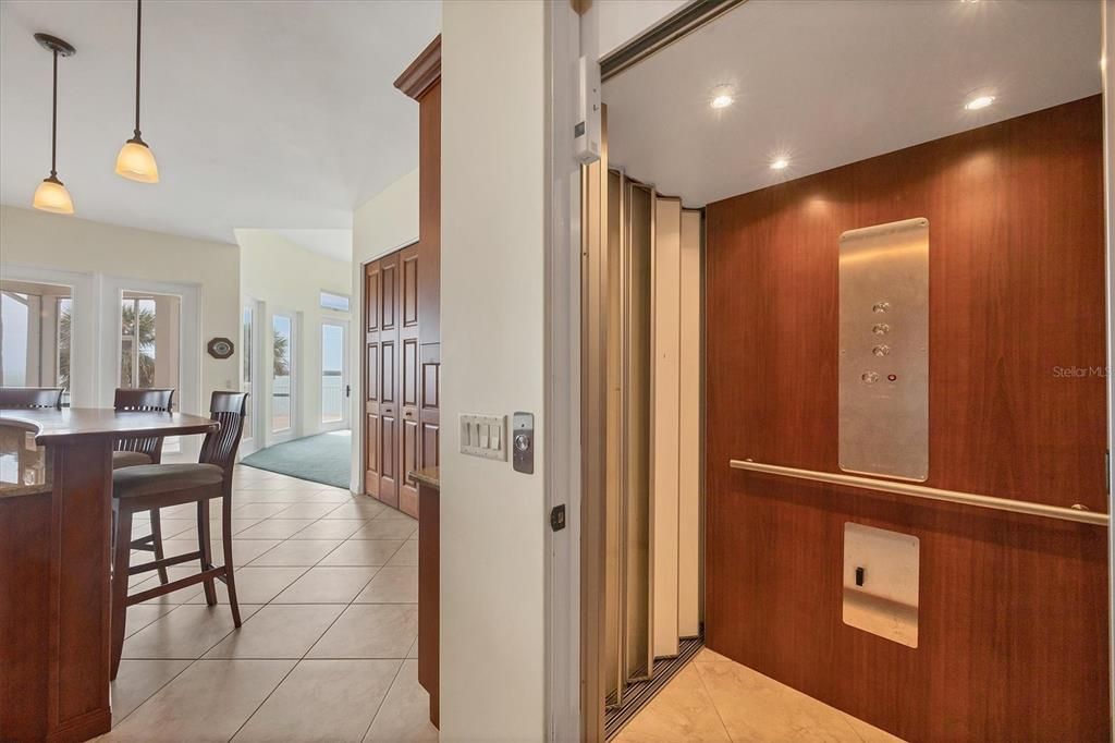 Dining room, Elevator, Interior, Pendant Lights, Recessed Lighting, Wooden Walls