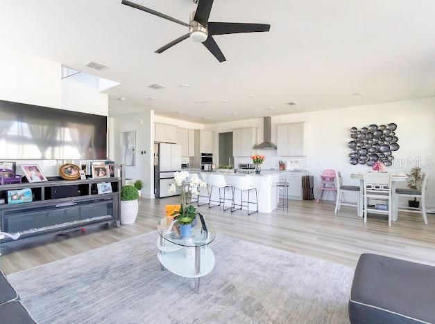Dining room, Interior, Kitchen, Recessed Lighting, Stainless Steel Appliances, Wood Texture Flooring