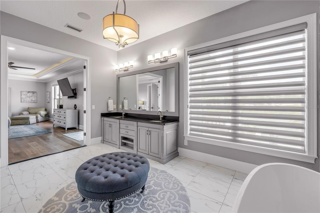 Bathroom, Free Standing Baths, Interior, Marble, Pendant Lights, Recessed Lighting, Wood Texture Flooring