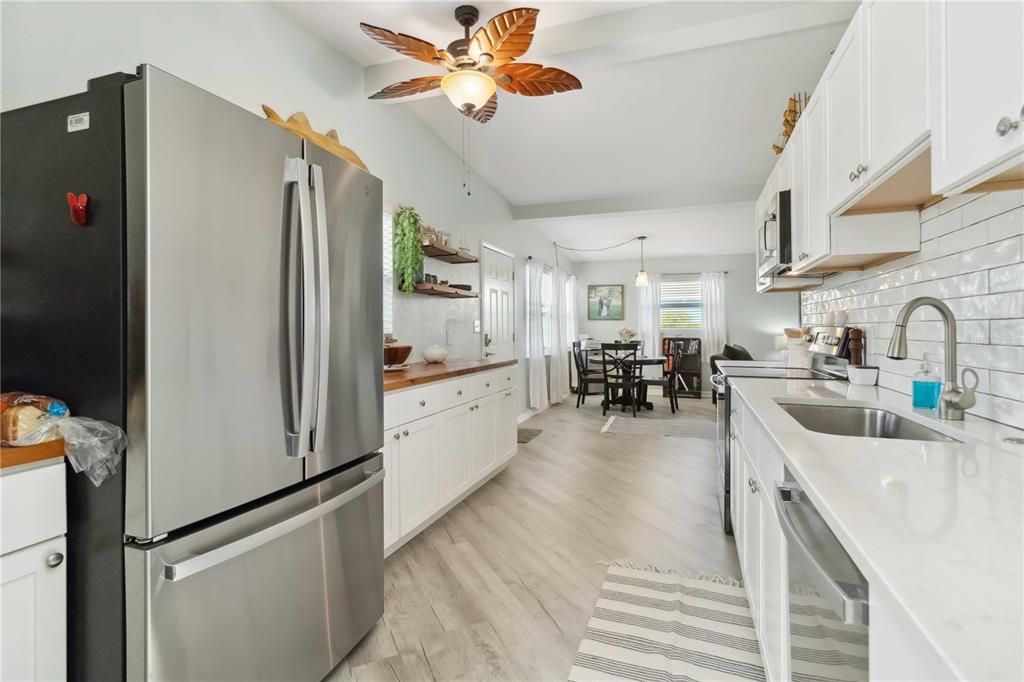 Dining room, Interior, Kitchen, Pendant Lights, Stainless Steel Appliances, Wood Texture Flooring