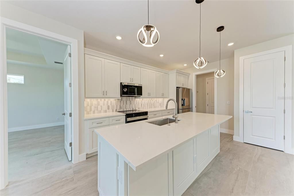 Interior, Kitchen, Marble, Pendant Lights, Recessed Lighting, Stainless Steel Appliances