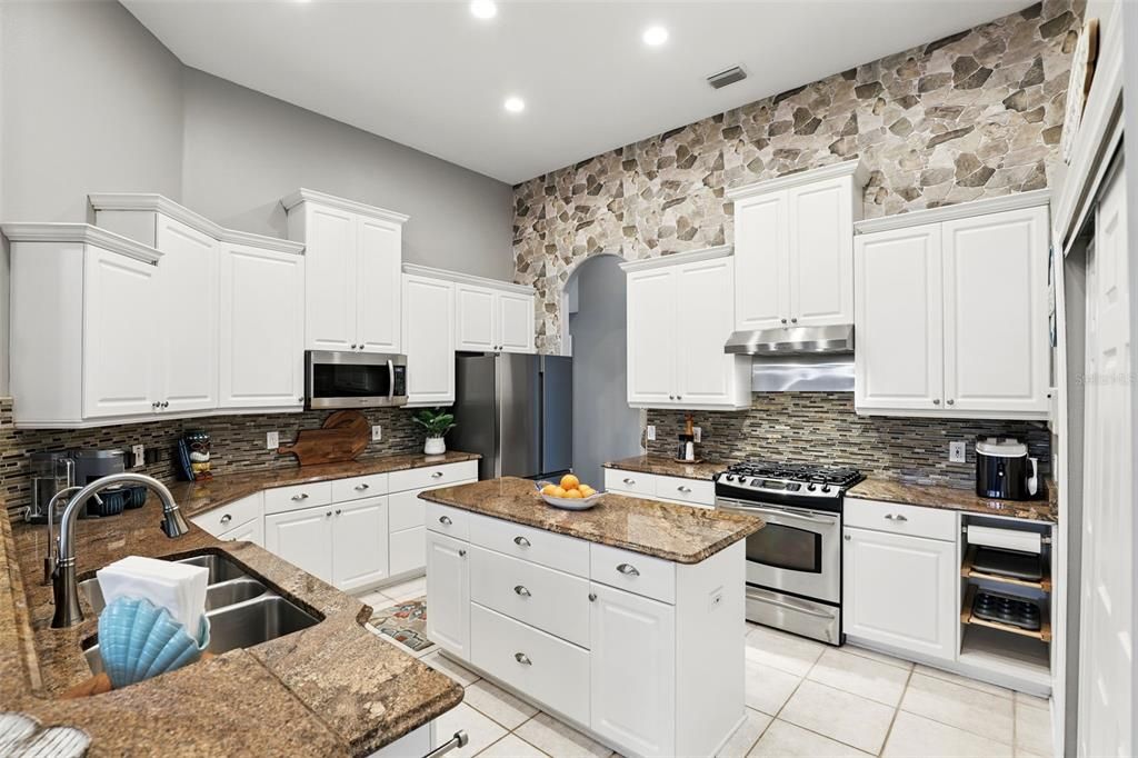 Interior, Kitchen, Recessed Lighting, Stainless Steel Appliances, Stone Walls