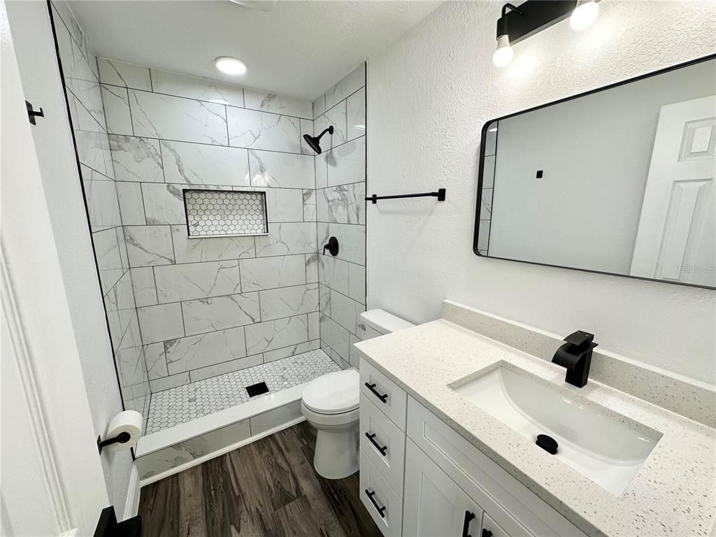 Bathroom, Interior, Marble Walls, Recessed Lighting, Wood Texture Flooring