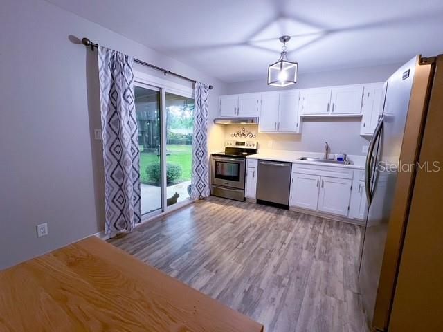 Interior, Kitchen, Pendant Lights, Stainless Steel Appliances, Wood Texture Flooring