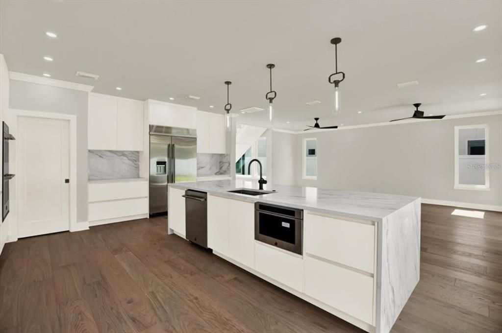 Interior, Kitchen, Pendant Lights, Recessed Lighting, Stainless Steel Appliances, Wood Texture Flooring