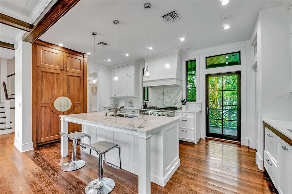 Interior, Kitchen, Marble Walls, Pendant Lights, Recessed Lighting, Wood Texture Flooring